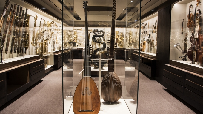 Interior of museum featuring musical instruments in display cases