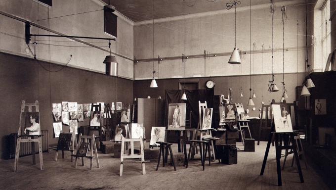 black and white photograph of Edinburgh College of Art Studio with student works on easels